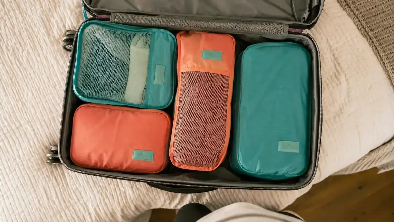 How to Pack Two Weeks of Clothes in a Carry-On Using Compression Cubes
